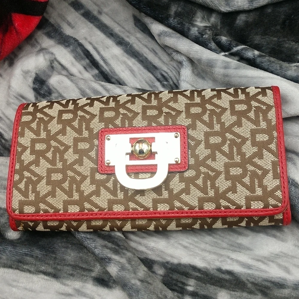 DKNY brown and tan wallet with red trim